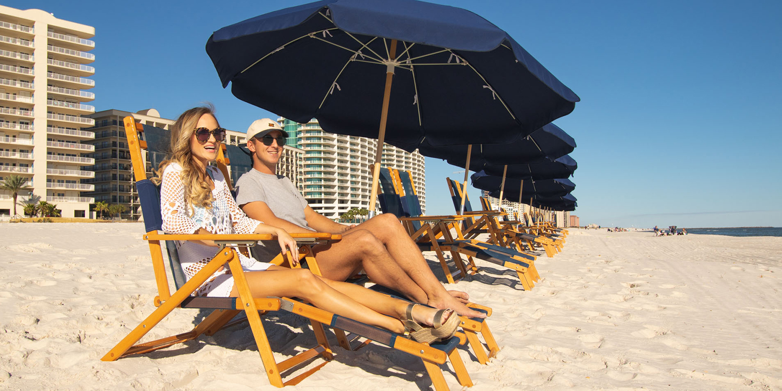 Couple relaxing in beach chairs